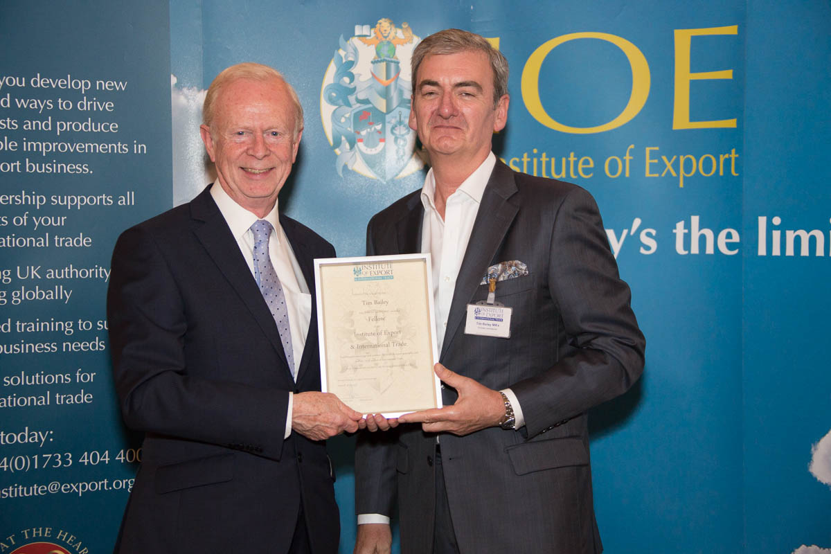 Tim Bailey given his award by Lord Empey OBE