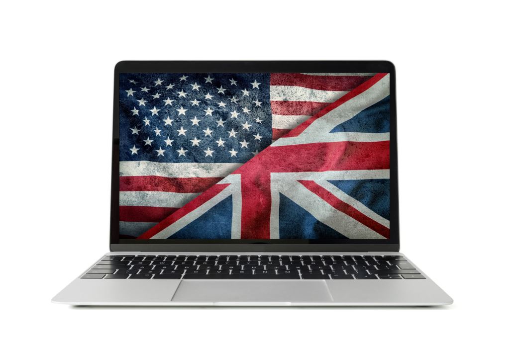 laptop screen with Untion Jack and USA flags
