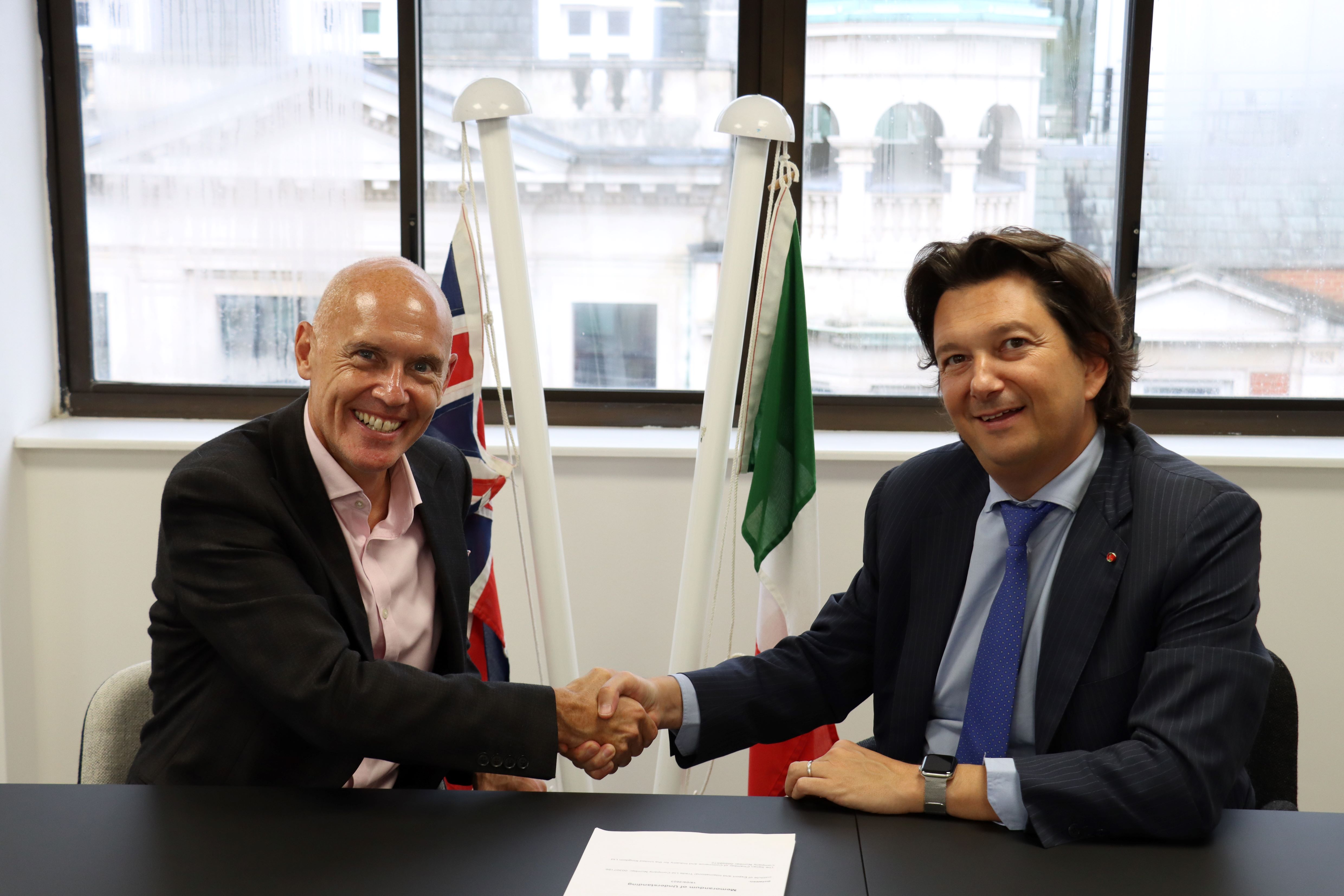 Marco Forgione shaking hands with Italian director general