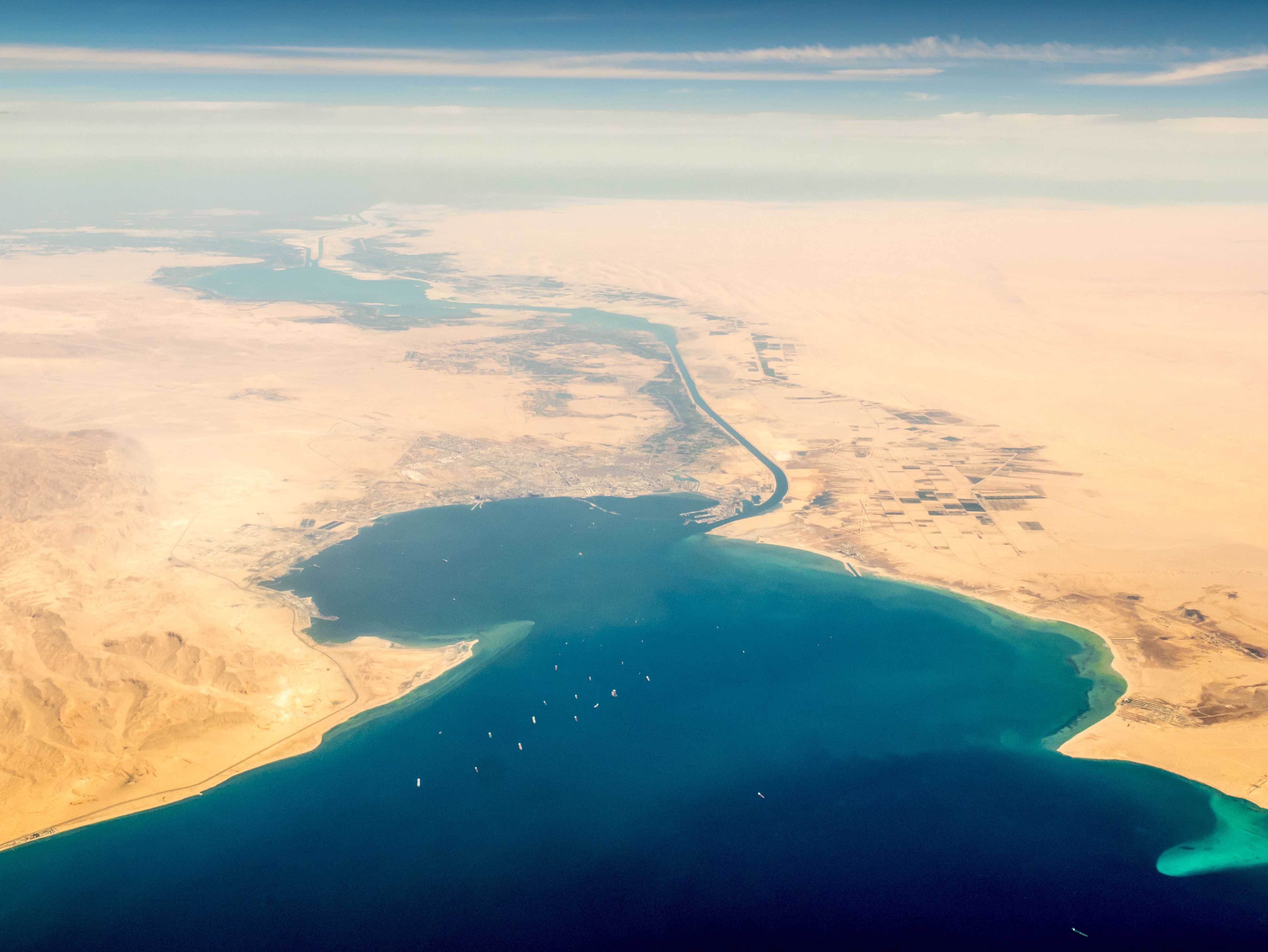 Suez Canal, leading to the Red Sea, with commercial vessels