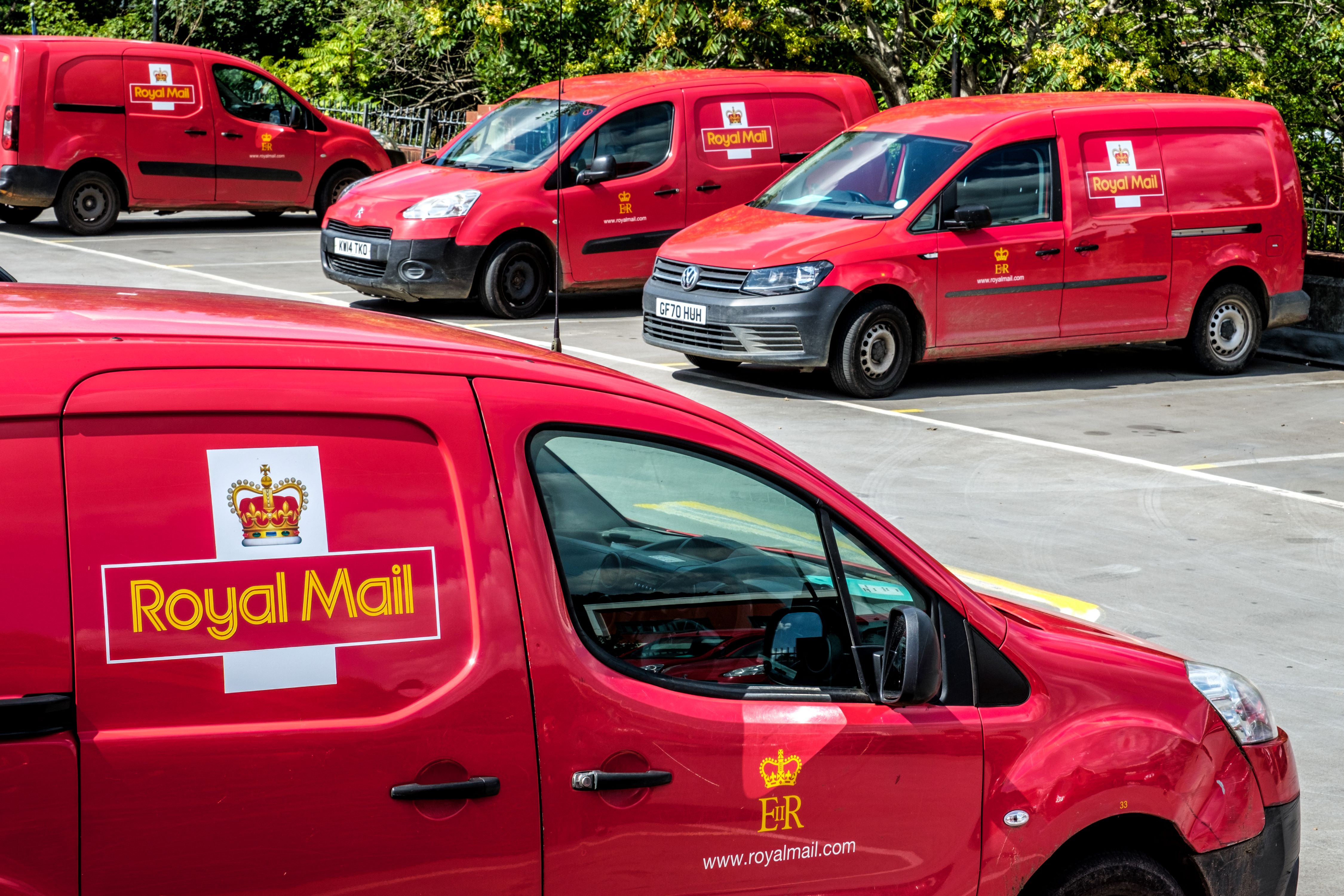 Royal Mail vans parked in car park