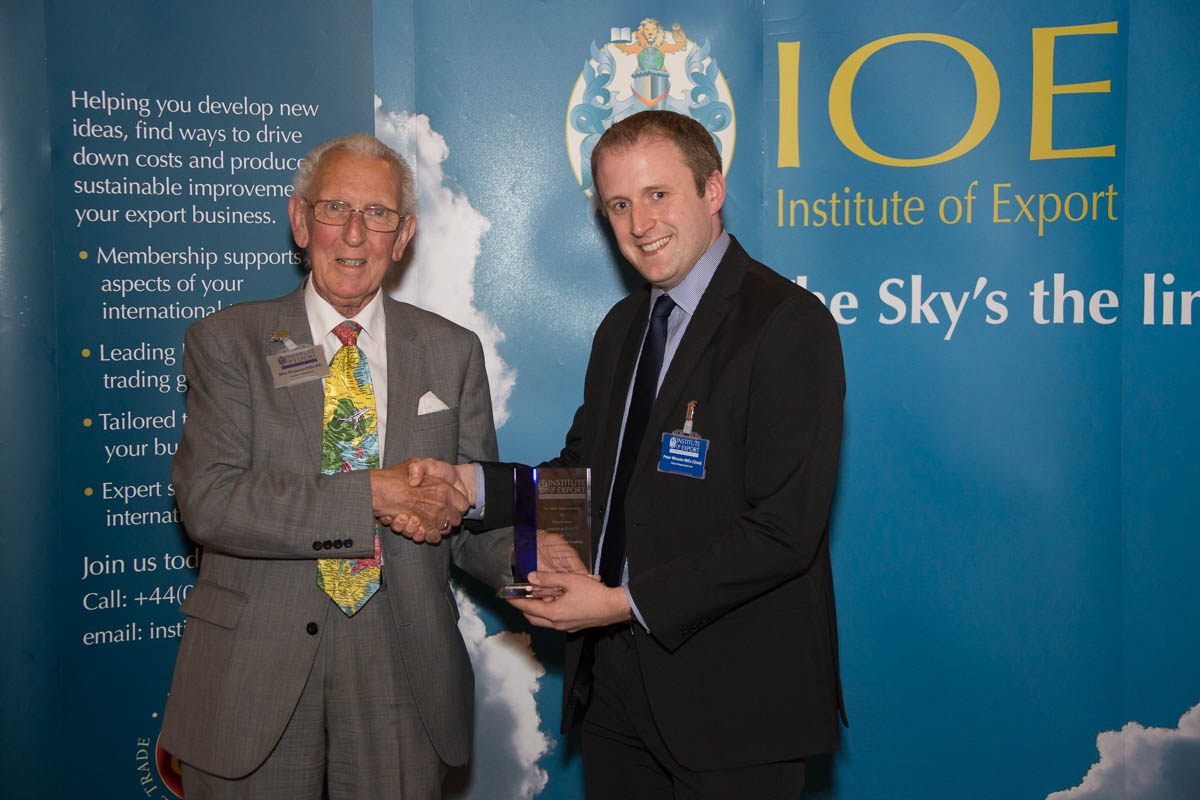 Mike Strawson presenting the award to Peter Wheeler