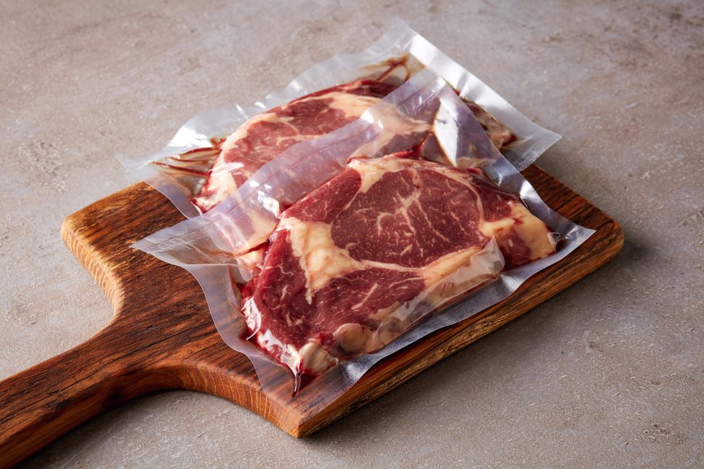 meat on a wooden slab