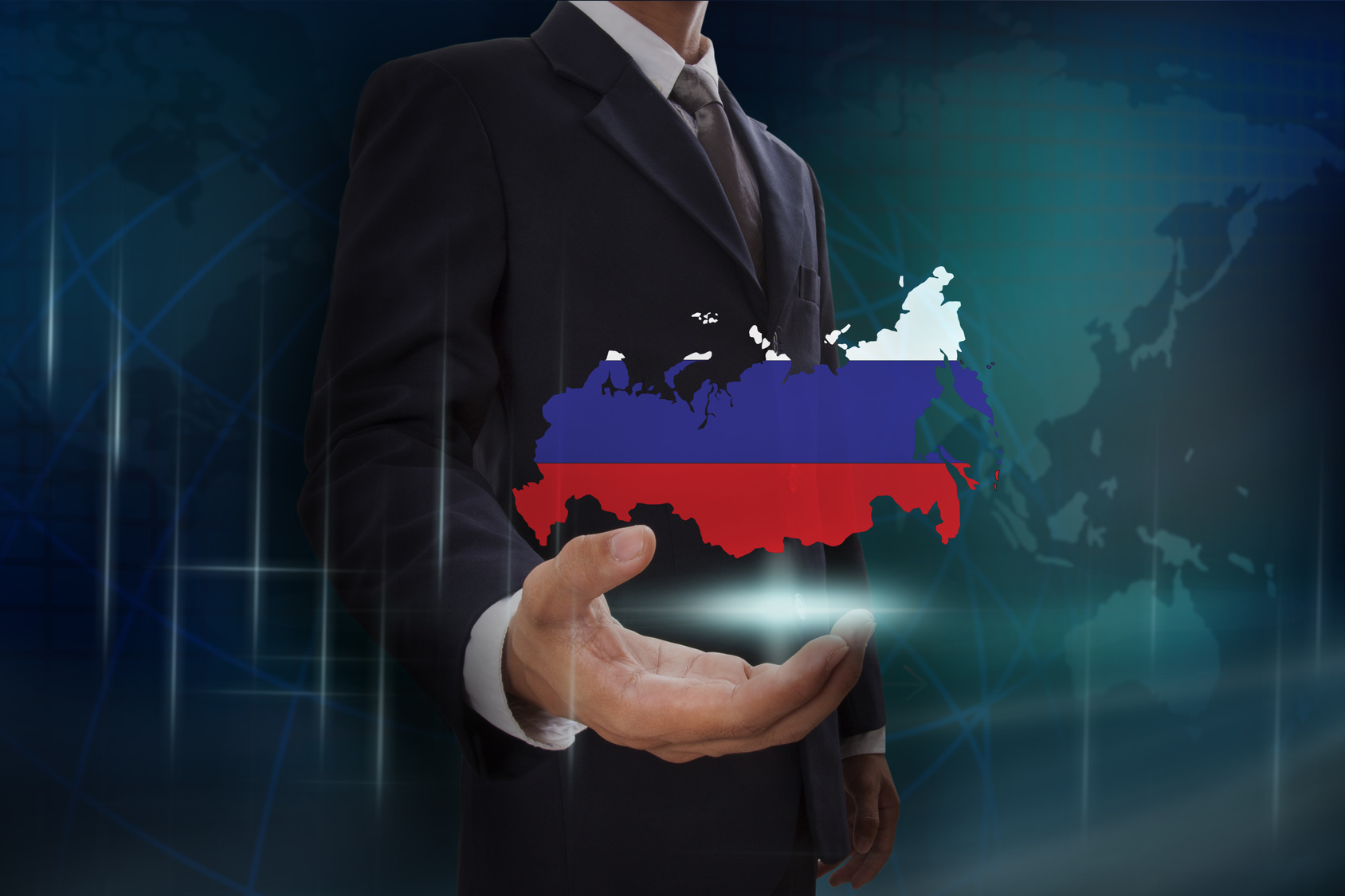 Businessman showing map of Russia on globe background